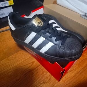 Black superstar addidas